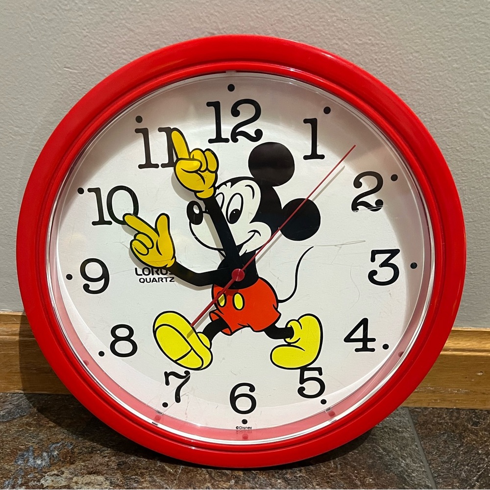 Vintage Disney red Lorus Mickey Mouse battery operated wall clock.